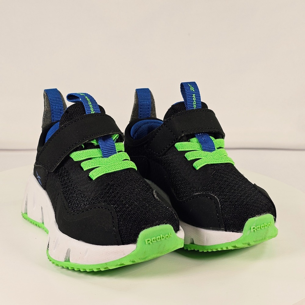 Reebok Zig N Glow Kids Sneakers Black‎ Neon Green Blue 30106TBKM Size 5 Toddler